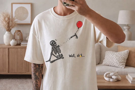 Seated Skeleton Red Balloon Shirt – “Well, Sh*t…” Funny Graphic Tee